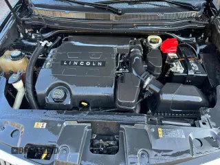 2015 Lincoln MKT with VIN 2LMHJ5NK0FBL03293, listed as a Copart auction lot 77810284 with 115,725 mi miles and Clean Title. Bid and sale history available at DreamBid. Image 7.