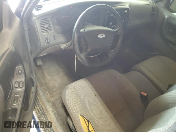 2001 Ford Ranger with VIN 1FTYR14U41TA50153, listed as a Copart auction lot 51297085 with 227,210 mi miles and Salvage Title. Bid and sale history available at DreamBid. Image 8.