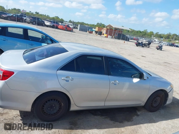 2012 Toyota Camry L with VIN 4T1BF1FK4CU569819, listed as a IAAI auction lot 41960672 with 234,171 mi miles. Bid and sale history available at carsss.com. Image 13.