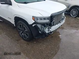 2021 GMC Acadia SLE with VIN 1GKKNKLA7MZ107658, listed as a IAAI auction lot 41547872 with 37,932 mi miles and . Bid and sale history available at DreamBid. Image 18.