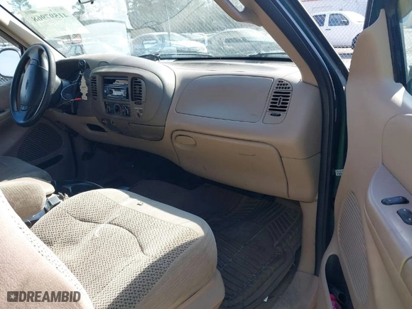 1999 Ford F-150 Work Series with VIN 1FTRX17W6XNB82190, listed as a IAAI auction lot 41597968 with NaN miles. Bid and sale history available at carsss.com. Image 5.