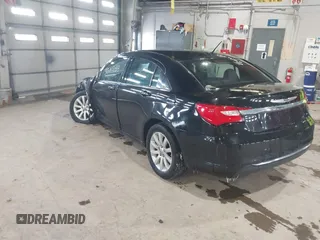 2013 Chrysler 200 Touring with VIN 1C3CCBBB6DN501373, listed as a IAAI auction lot 41587159 with 193,410 mi miles and . Bid and sale history available at DreamBid. Image 3.