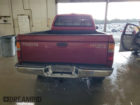 1998 Toyota Tacoma with VIN 4TAWN72NXWZ132180, listed as a Copart auction lot 65593695 with 266,993 mi miles and Salvage title. Bid and sale history available at DreamBid. Image 6.