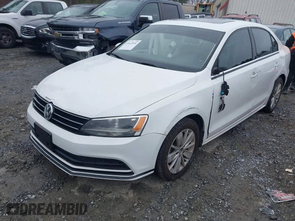2015 Volkswagen Jetta Sedan 1.8T SE with VIN 3VWD17AJ6FM237674, listed as a IAAI auction lot 41613054 with 71,325 mi miles. Bid and sale history available at carsss.com. Image 2.