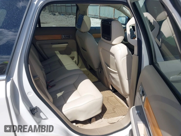 2007 Lincoln MKX with VIN 2LMDU88CX7BJ22585, listed as a IAAI auction lot 42061572 with 148,029 mi miles. Bid and sale history available at carsss.com. Image 8.