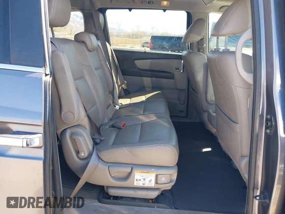 2015 Honda Odyssey EX-L with VIN 5FNRL5H66FB063215, listed as a IAAI auction lot 41846532 with 153,048 mi miles and . Bid and sale history available at carsss.com. Image 8.