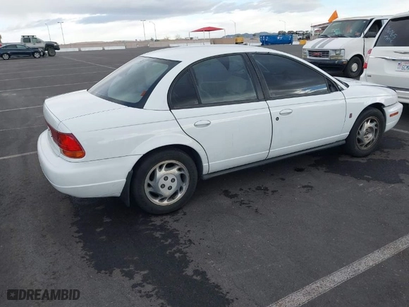 1997 Saturn SL with VIN 1G8ZK5275VZ254745, listed as a IAAI auction lot 41686816 with 135,074 mi miles. Bid and sale history available at carsss.com. Image 4.
