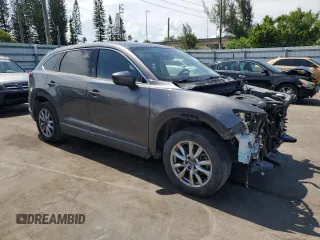 2016 Mazda CX-9 Touring with VIN JM3TCACY3G0115334, listed as a Copart auction lot 64129265 with 156,674 mi miles and Clean title. Bid and sale history available at DreamBid. Image 4.