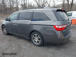 2012 Honda Odyssey EX with VIN 5FNRL5H42CB086159, listed as a IAAI auction lot 42096834 with 208,701 mi miles. Bid and sale history available at carsss.com. Image 3.
