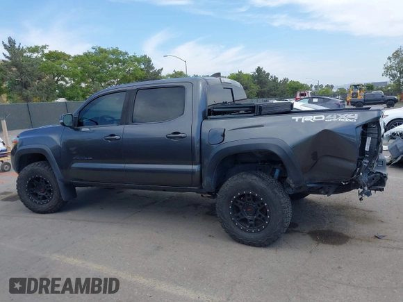 2019 Toyota Tacoma SR with VIN 3TMCZ5AN3KM207783, listed as a IAAI auction lot 42375280 with 55,784 mi miles and . Bid and sale history available at DreamBid. Image 15.