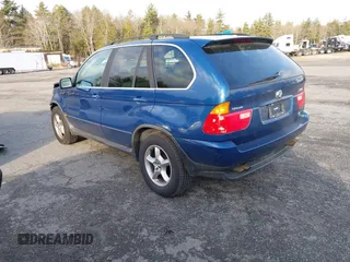 2001 BMW X5 4.4i with VIN WBAFB33501LH24719, listed as a IAAI auction lot 41055076 with 126,530 mi miles. Bid and sale history available at carsss.com. Image 3.