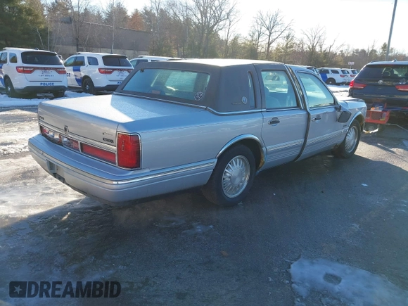 1997 Lincoln Town Car Cartier with VIN 1LNLM83W9VY661126, listed as a IAAI auction lot 41456847 with 160,710 mi miles and . Bid and sale history available at DreamBid. Image 4.