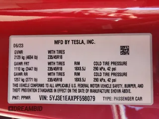 2023 Tesla Model 3 with VIN 5YJ3E1EAXPF598079, listed as a Copart auction lot 55199405 with Not provided miles and Salvage title. Bid and sale history available at DreamBid. Image 12.