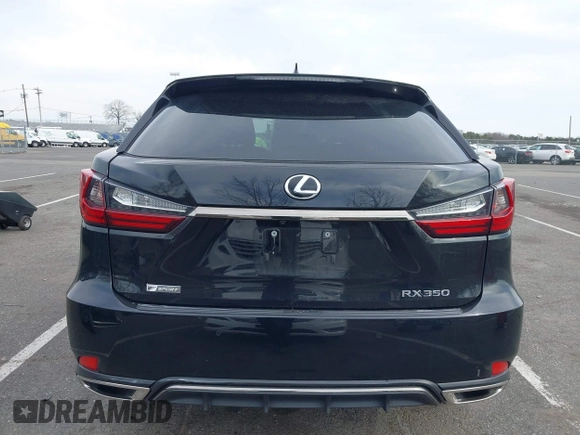 2020 Lexus RX with VIN 2T2SZMDA8LC256854, listed as a IAAI auction lot 41822801 with 74,814 mi miles. Bid and sale history available at carsss.com. Image 16.