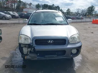 2002 Hyundai Santa Fe GLS with VIN KM8SC73D62U209998, listed as a IAAI auction lot 41915060 with 228,451 mi miles. Bid and sale history available at carsss.com. Image 12.