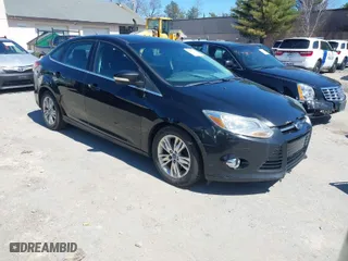 2012 Ford Focus SEL with VIN 1FAHP3H20CL269601, listed as a IAAI auction lot 42007095 with 146,634 mi miles. Bid and sale history available at carsss.com. Image 1.