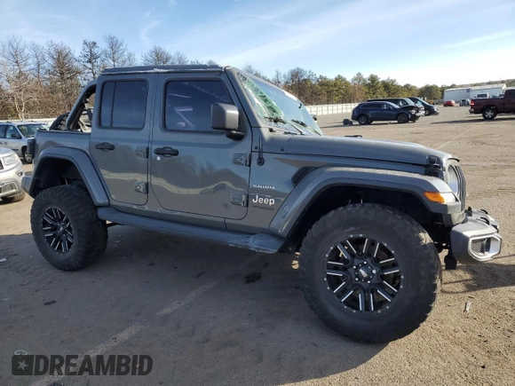 2019 Jeep Wrangler Unlimited Sahara with VIN 1C4HJXEG7KW573265, listed as a Copart auction lot 42683745 with 63,393 mi miles and Salvage title. Bid and sale history available at DreamBid. Image 4.