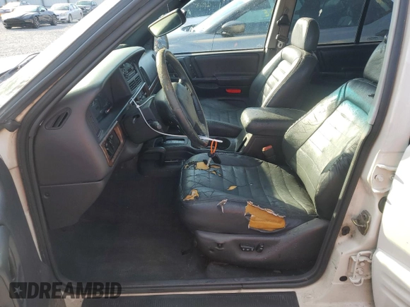 1998 Jeep Grand Cherokee Laredo with VIN 1J4GZ48Y9WC203024, listed as a Copart auction lot 83813114 with 105,044 mi miles and Non Repairable. Bid and sale history available at carsss.com. Image 7.