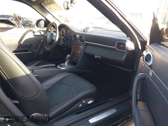2011 Porsche 911 Carrera S with VIN WP0AB2A92BS721421, listed as a IAAI auction lot 41435751 with 42,155 mi miles and . Bid and sale history available at DreamBid. Image 5.