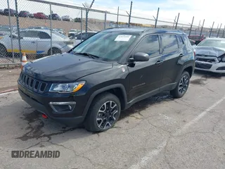 2020 Jeep Compass Trailhawk with VIN 3C4NJDDB7LT129673, listed as a IAAI auction lot 41811055 with 30,106 mi miles and . Bid and sale history available at carsss.com. Image 17.