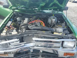 1991 Toyota Pickup z VIN JT4RN13P9M6023450, wystawiony jako Copart lot #61621235 z przebiegiem 599 120 mil mil oraz Szkoda całkowita • Salvage title. Historia ofert i sprzedaży dostępna na DreamBid. Obrazek 11.