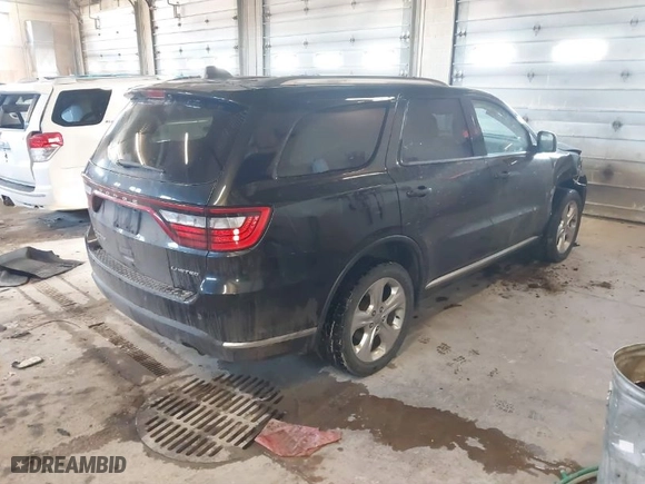 2014 Dodge Durango Limited with VIN 1C4RDJDG1EC973130, listed as a IAAI auction lot 41846596 with 166,182 mi miles. Bid and sale history available at carsss.com. Image 4.
