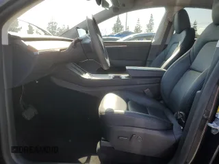 2024 Tesla Model Y with VIN 7SAYGDED7RF056973, listed as a Copart auction lot 55310705 with 15,391 mi miles and Salvage Title. Bid and sale history available at DreamBid. Image 7.