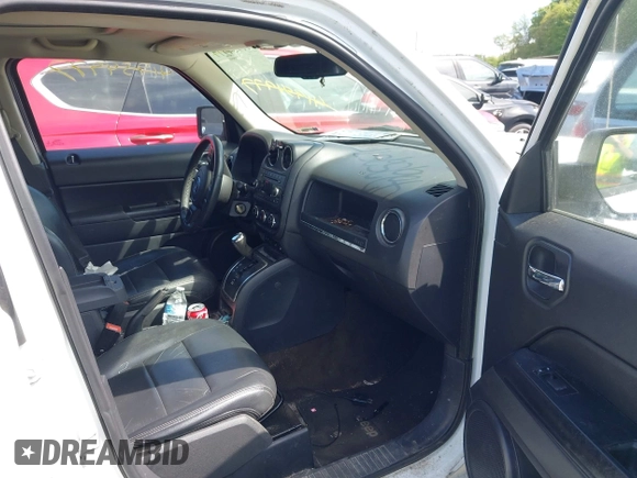 2015 Jeep Patriot Latitude with VIN 1C4NJRFB4FD394829, listed as a IAAI auction lot 42252571 with 113,071 mi miles and . Bid and sale history available at DreamBid. Image 5.