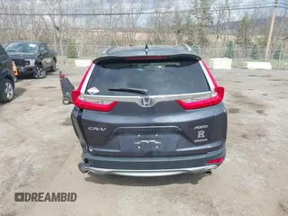 2019 Honda CR-V Touring with VIN 2HKRW2H9XKH636354, listed as a IAAI auction lot 41902615 with 66,781 mi miles and . Bid and sale history available at DreamBid. Image 16.