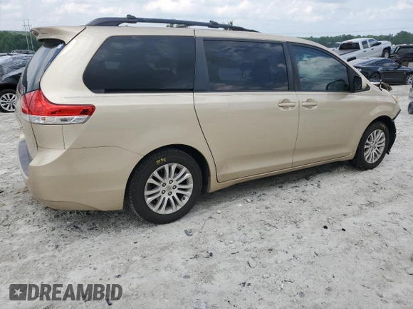 2011 Toyota Sienna XLE AAS с VIN 5TDYK3DC8BS106182, выставлен на аукционе Copart как лот 57728465 с пробегом 168 468 миль миль и Списание • Salvage title. История ставок и продаж доступна на DreamBid. Изображение 3.