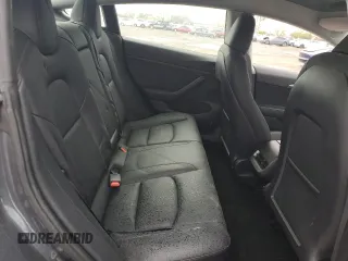 2023 Tesla Model 3 with VIN 5YJ3E1EA8PF677153, listed as a Copart auction lot 51065165 with 27,088 mi miles and Salvage Title. Bid and sale history available at carsss.com. Image 10.
