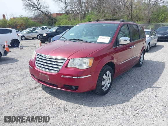 2010 Chrysler Town & Country Limited with VIN 2A4RR7DX2AR358067, listed as a IAAI auction lot 42065257 with 188,290 mi miles and . Bid and sale history available at carsss.com. Image 2.