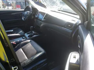 2018 Honda Pilot EX-L with VIN 5FNYF6H59JB062326, listed as a IAAI auction lot 40662881 with 77,573 mi miles and . Bid and sale history available at DreamBid. Image 5.