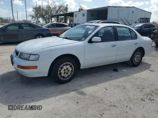 1995 Nissan Maxima GLE с VIN JN1CA21D6ST059369, выставлен на аукционе Copart как лот 74794884 с пробегом 246 806 миль миль и Списание • Salvage title. История ставок и продаж доступна на DreamBid. Изображение 1.