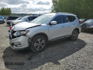 2018 Nissan Rogue SV with VIN 5N1AT2MV9JC745208, listed as a Copart auction lot 54976985 with 101,352 mi miles and Salvage Title. Bid and sale history available at DreamBid. Image 1.