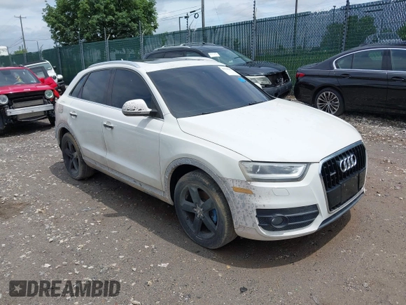 2015 Audi Q3 Premium Plus z VIN WA1EFCFS8FR001278, wystawiony jako IAAI lot #42475043 z przebiegiem 125 417 mil mil oraz . Historia ofert i sprzedaży dostępna na DreamBid. Obrazek 1.