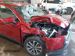 2024 Toyota Corolla Cross XLE with VIN 7MUDAABG3RV088783, listed as a IAAI auction lot 42433593 with 11,687 mi miles and . Bid and sale history available at DreamBid. Image 6.