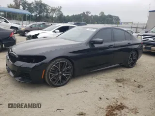 2021 BMW 5 Series M550i xDrive z VIN WBA13BK0XMCF46927, wystawiony jako Copart lot #72636684 z przebiegiem 31 044 mil mil oraz Czysty tytuł • Clean title. Historia ofert i sprzedaży dostępna na DreamBid. Obrazek 1.