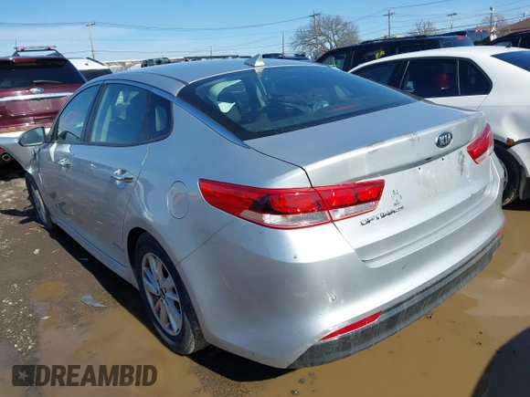 2016 Kia Optima LX with VIN 5XXGT4L34GG078857, listed as a IAAI auction lot 41819971 with 112,963 mi miles. Bid and sale history available at carsss.com. Image 3.