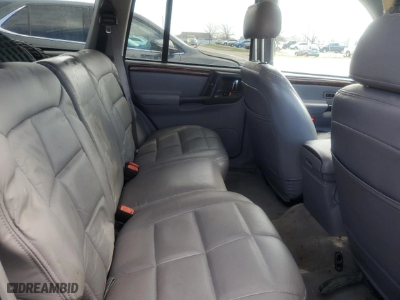 1998 Jeep Grand Cherokee Limited with VIN 1J4GZ78Y0WC140588, listed as a Copart auction lot 49522445 with 62,195 mi miles and Salvage Title. Bid and sale history available at carsss.com. Image 11.