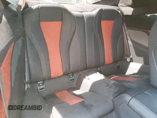 2023 BMW M8 Competition z VIN WBSAE0C04PCL03625, wystawiony jako Copart lot #52190975 z przebiegiem Nie podano mil oraz Nie do naprawy. Historia ofert i sprzedaży dostępna na DreamBid. Obrazek 10.
