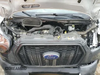 2021 Ford Transit Cargo с VIN 1FTBR1X87MKA53899, выставлен на аукционе Copart как лот 53969705 с пробегом 94 115 миль миль и Списание • Salvage title. История ставок и продаж доступна на DreamBid. Изображение 12.