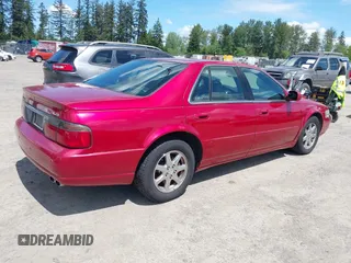 2002 Cadillac Seville Luxury SLS z VIN 1G6KS54Y52U304911, wystawiony jako IAAI lot #42333307 z przebiegiem 123 284 mil mil oraz . Historia ofert i sprzedaży dostępna na DreamBid. Obrazek 4.
