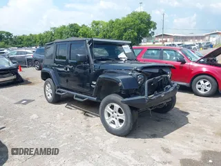 2008 Jeep Wrangler Unlimited Sahara with VIN 1J4GA59128L608515, listed as a IAAI auction lot 42627584 with 157,821 mi miles and . Bid and sale history available at DreamBid. Image 1.