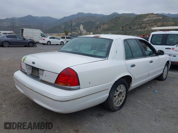 2003 Ford Crown Victoria LX z VIN 2FAFP74WX3X154904, wystawiony jako IAAI lot #42094274 z przebiegiem 123 579 mil mil oraz . Historia ofert i sprzedaży dostępna na DreamBid. Obrazek 4.