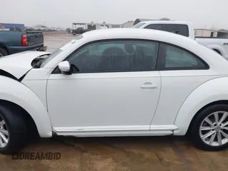 2018 Volkswagen Beetle S with VIN 3VWFD7AT3JM703443, listed as a IAAI auction lot 41437909 with 76,757 mi miles. Bid and sale history available at carsss.com. Image 14.