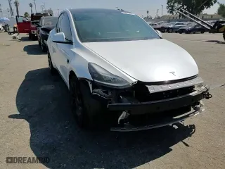 2022 Tesla Model Y Performance with VIN 7SAYGDEF0NF394002, listed as a Copart auction lot 73015674 with 35,396 mi miles and Salvage Title. Bid and sale history available at carsss.com. Image 10.
