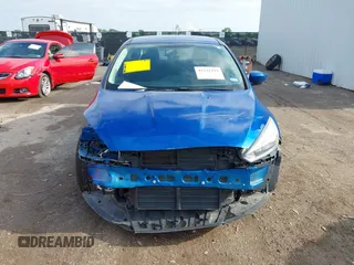 2018 Ford Focus SE z VIN 1FADP3F2XJL293337, wystawiony jako IAAI lot #42121294 z przebiegiem 71 241 mil mil oraz . Historia ofert i sprzedaży dostępna na DreamBid. Obrazek 12.