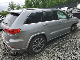 2018 Jeep Grand Cherokee Overland z VIN 1C4RJFCTXJC108624, wystawiony jako Copart lot #53738094 z przebiegiem 83 040 mil mil oraz . Historia ofert i sprzedaży dostępna na DreamBid. Obrazek 3.