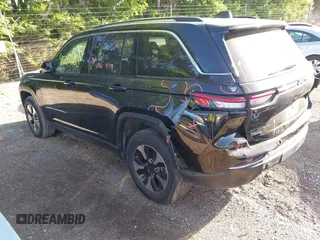 2023 Jeep Grand Cherokee with VIN 1C4RJYB68PC648859, listed as a IAAI auction lot 42267180 with 29,809 mi miles and . Bid and sale history available at DreamBid. Image 3.